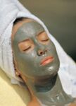 Woman with Sole facial mask